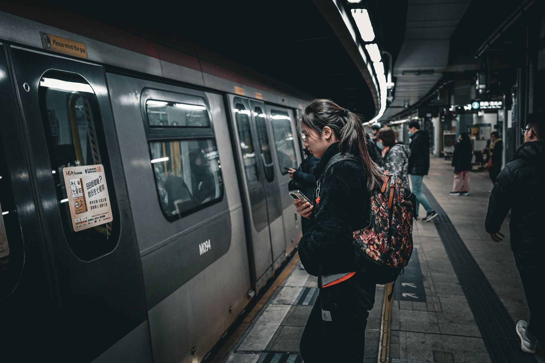 Commuters boarding a subway train